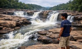 Perunthenaruvi Waterfalls Kerala with a young visitor observing safety.