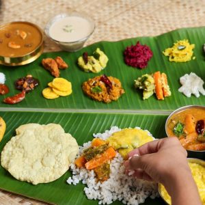 Traditional Onam Sadya feast on banana leaf for international tourists