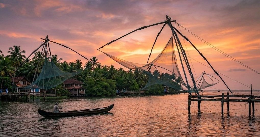 Kumbalangi Nights movie location: Chinese fishing nets at sunset in Kochi, Kerala.