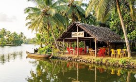 Scenic Kerala toddy shop located by the backwaters.
