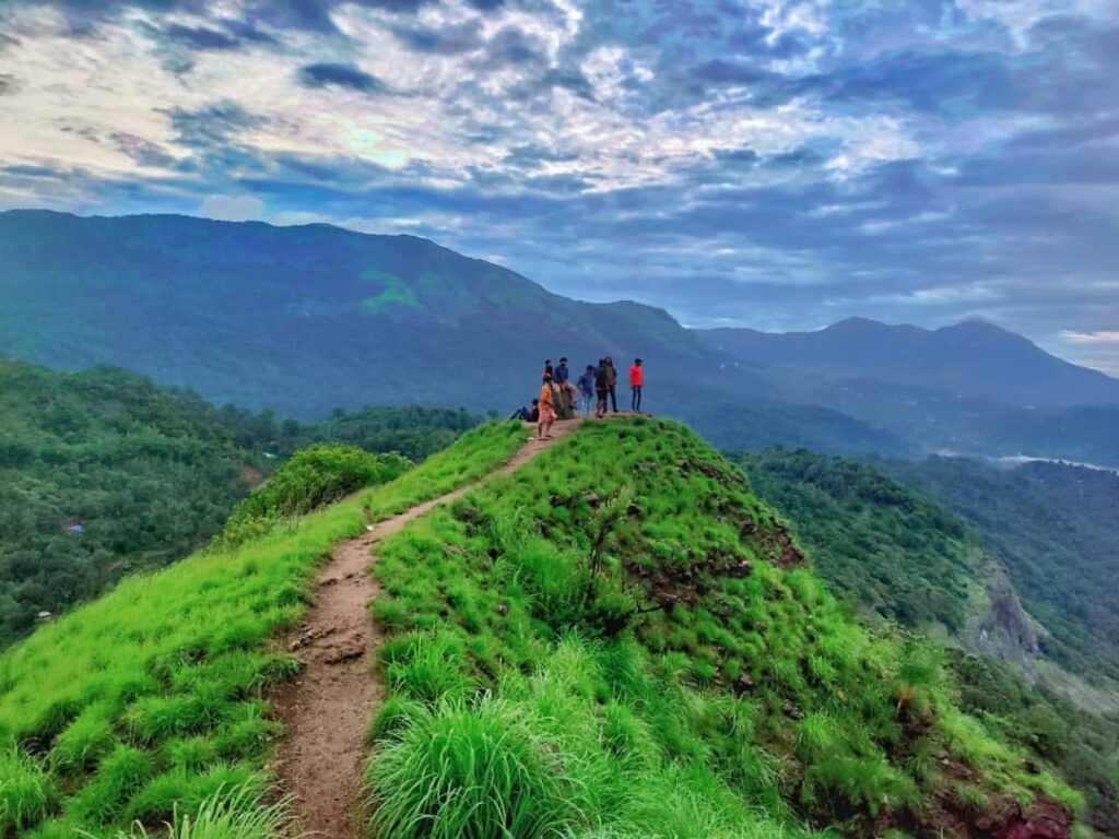 Misty sunrise view from Pettimudi Hill Top Adimali8