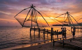 A wide-angle landscape photograph captured during a golden sunrise