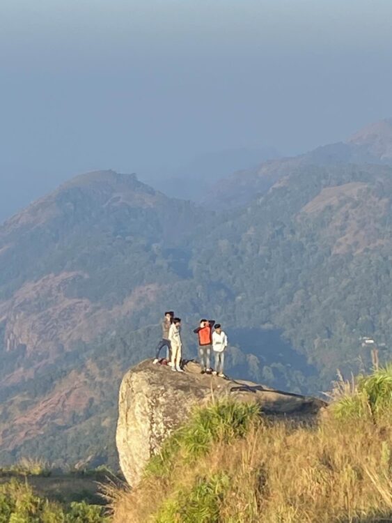 Misty sunrise view from Pettimudi Hill Top Adimali9