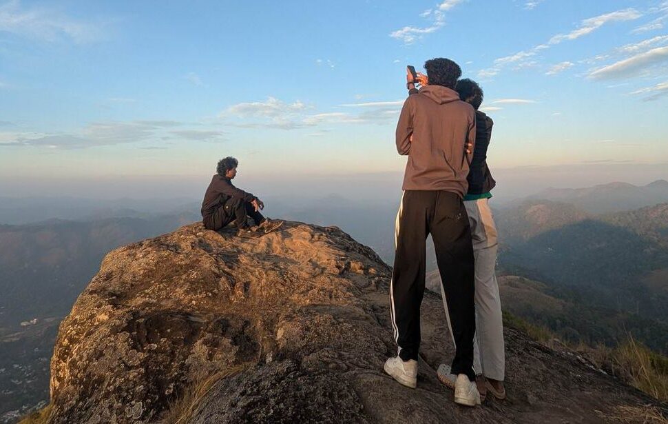 Misty sunrise view from Pettimudi Hill Top Adimali