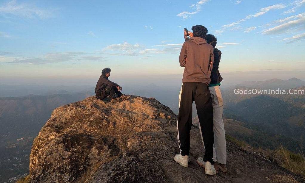 Misty sunrise view from Pettimudi Hill Top Adimali