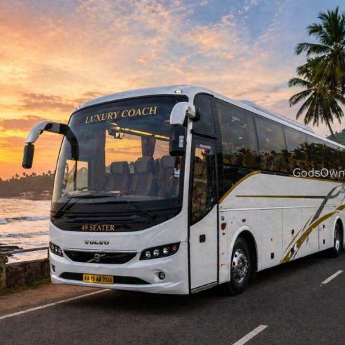 A 49-seater luxury coach parked near a scenic coastal road