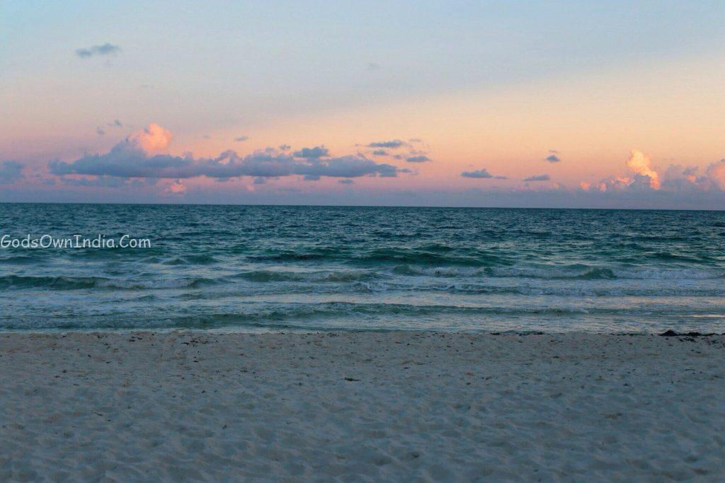seashore with sea during golden hour