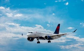 white passenger plane under blue sky during daytime